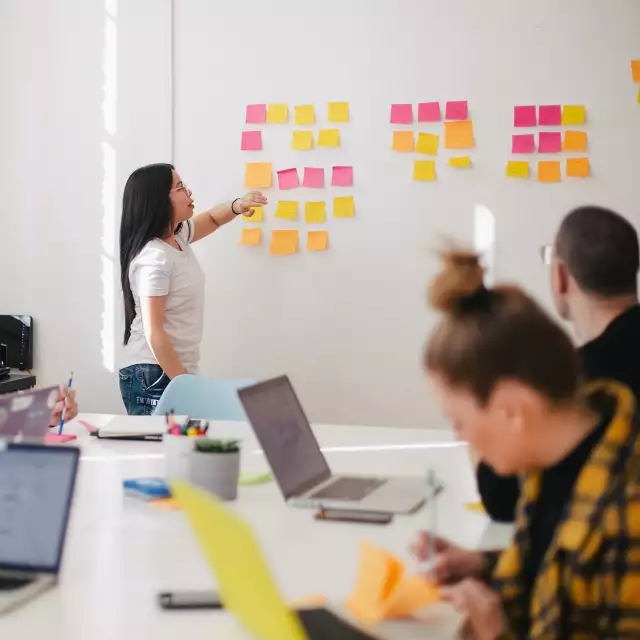 Team brainstorming in conference room