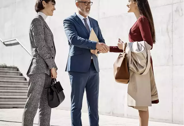 Coworkers shaking hands