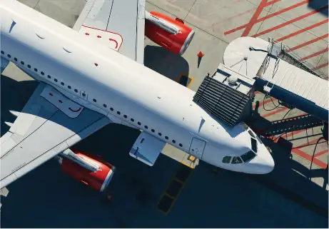 Cargo being loaded onto airplane