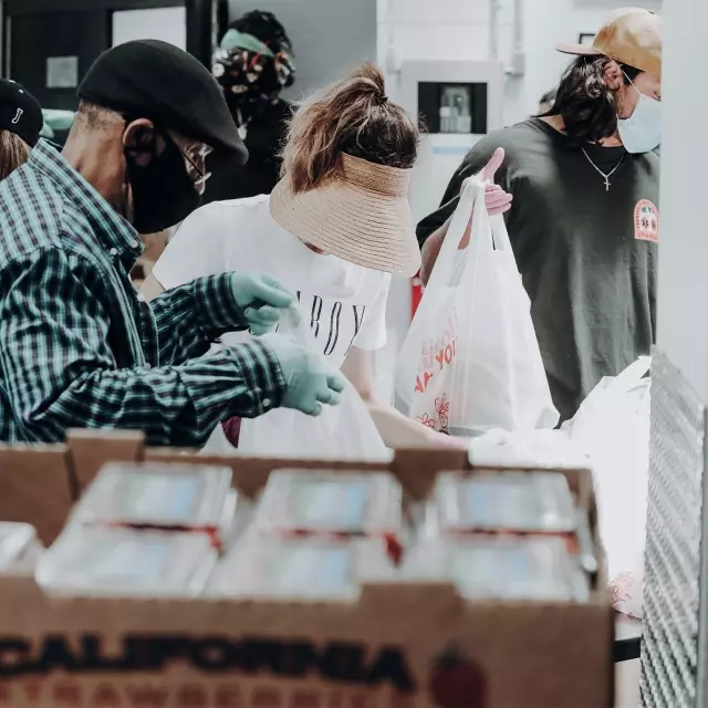 Volunteers helping with donations