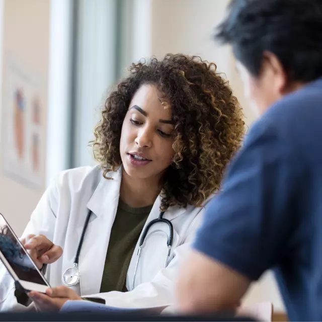 Nurse speaking to patient