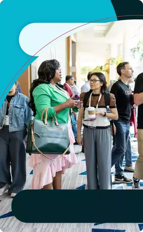 Customers talking at a conference