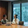 Two women in office